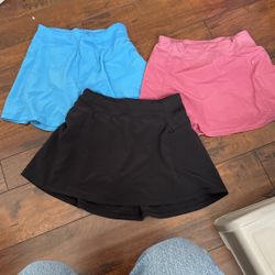 3 pack all in motion girls tennis skirts size L (10/12)