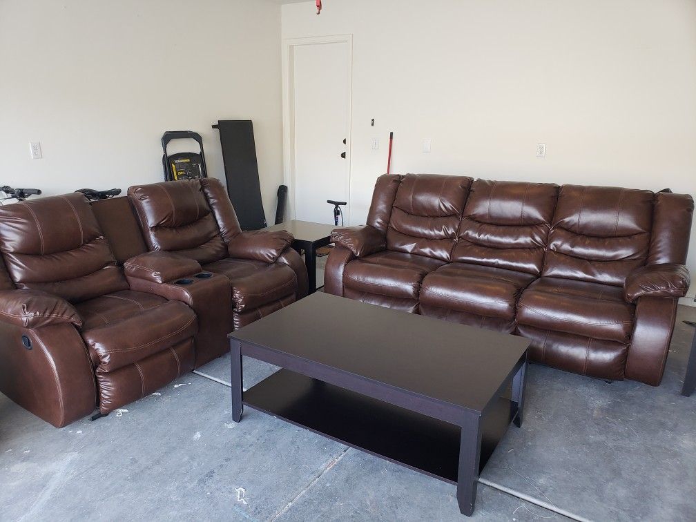 Brown leather couch set, coffee table and end table