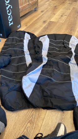 Black with grey seat covers with head rest covers