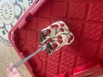 The Coach Mini Bucket Bag with Cherry Print