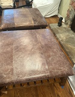 2 High end leather cocktail ottomans/tables