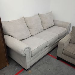 Small beige sofa couch