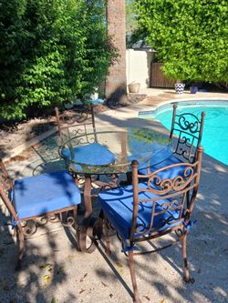 Wrought iron table and chairs