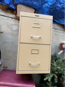 2-DRAWER FILE CABINET, 15"w x 17"deep x 26"tall; there is  a little leg missing at bottom, be sure to check the pictures closely; cross streets are Ar