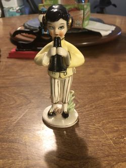 Antique Flute Playing Figurine