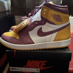 Jordan 1 Retro High OG University Gold and light bordeaux