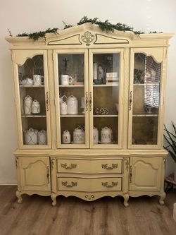 China hutch with lights and side bar.