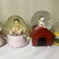 Lot Of Four Snow Globes  $23