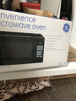 BRAND NEW GE MICROWAVE