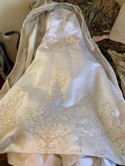 Beautiful studded /beaded white strapless corset wedding dress from David’s Bridal Ideally used for Beauty pageants $1600 or best offer No low ball