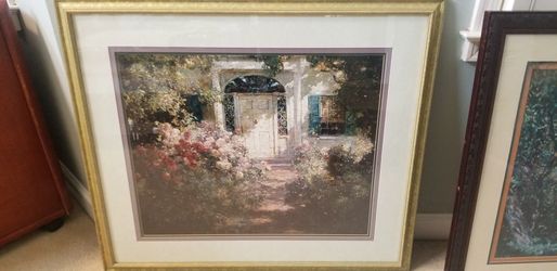 French garden print with heavy gold frame.