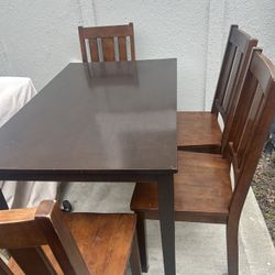 Brown Dining Table And 4 Chairs