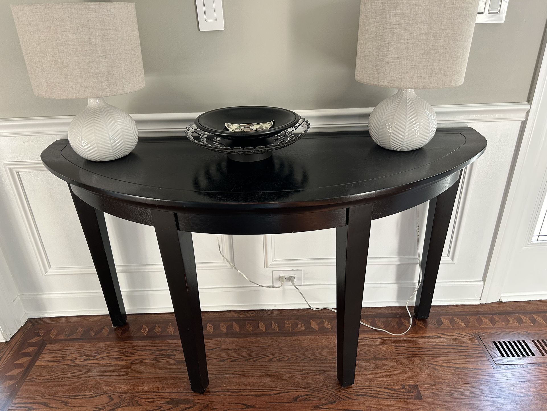 Black round console table