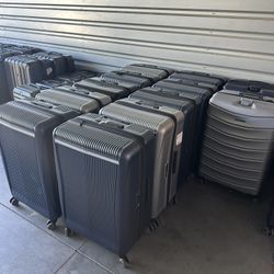 Samsonite 2pc Check-In and Carry-on Luggage Set. Available in several colors/sizes