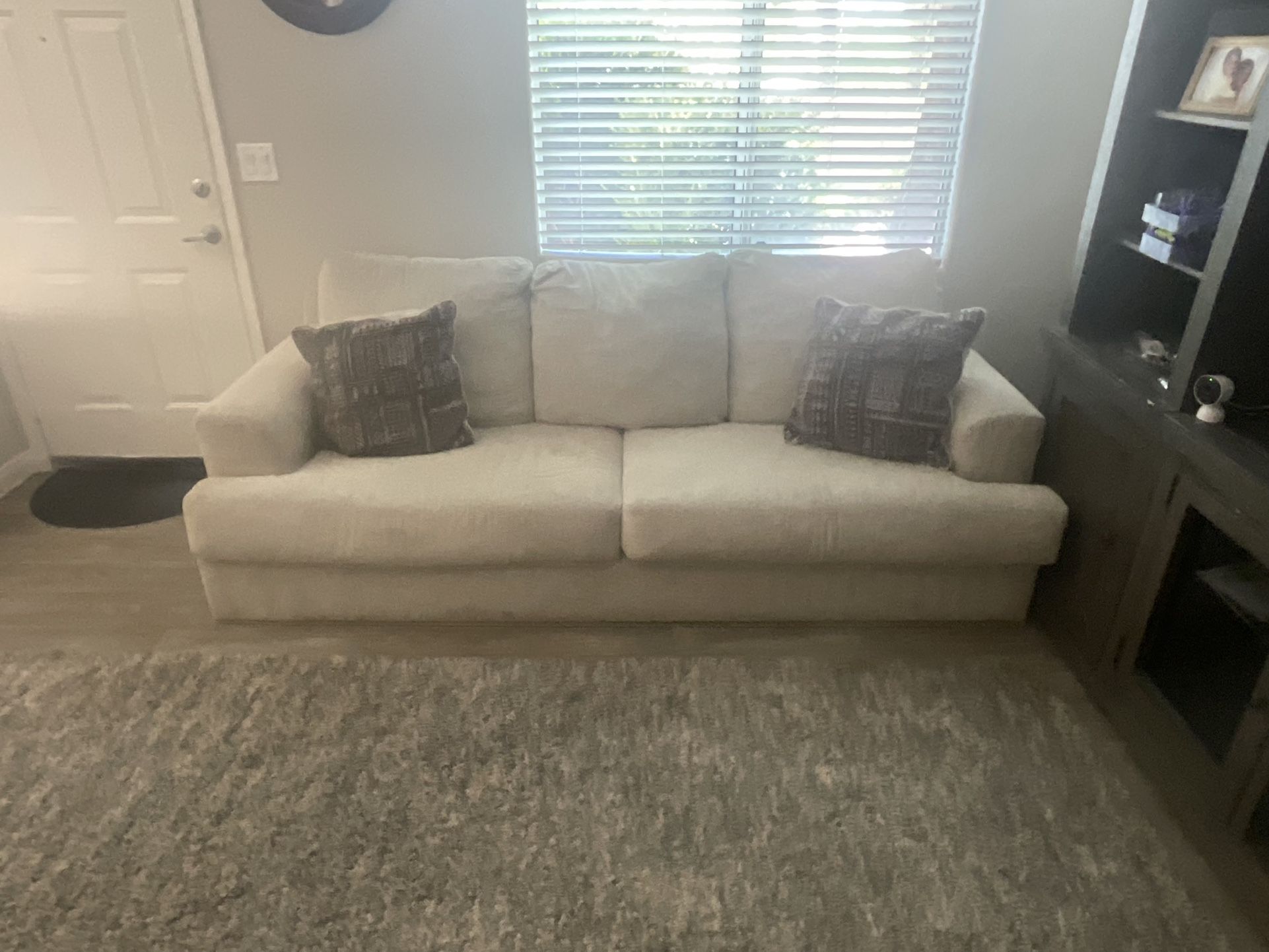 Ashley’s  Couches (Pillows Included)