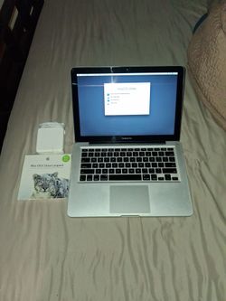 Macbook pro with software and power cable