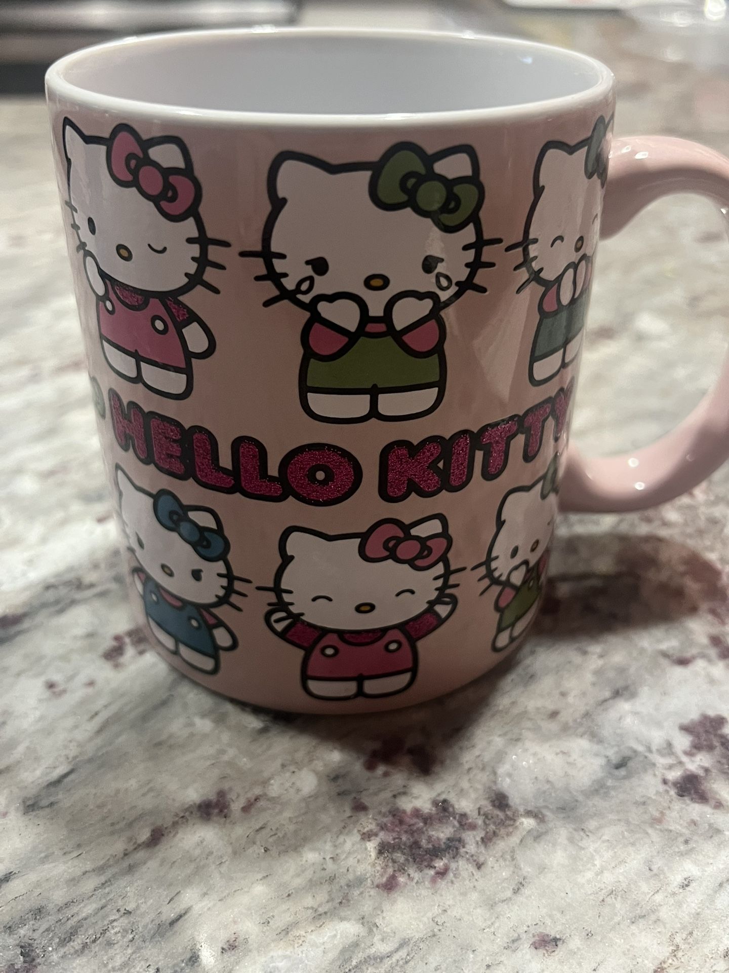 Silver Buffalo Sanrio Hello Kitty Expressions ceramic mug.