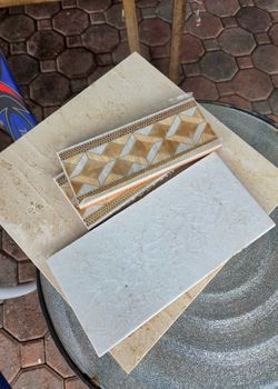 Assortment of tiles for med bathroom . All must go . All new in boxes .