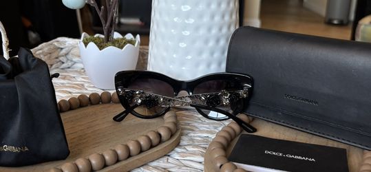 Dolce & Gabbana sunglasses, excellent condition. Price: $150.