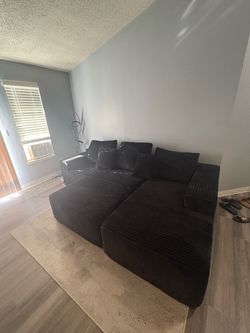 Black L couch with ottoman