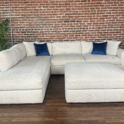 Delivery Available Costco ivory 2pc sectional couch w ottoman retails 1300
