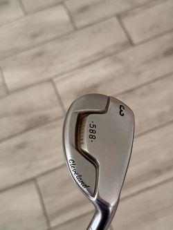 Cleveland 588 Altitude hybrid-style iron, specifically a 3-iron  right handed