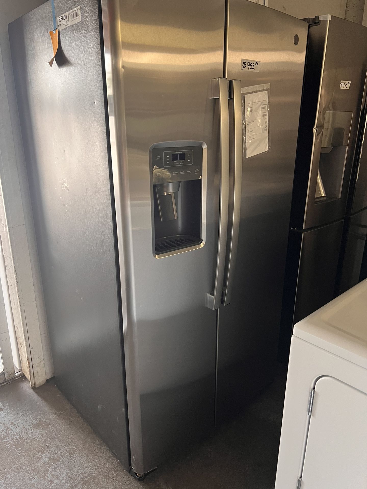 New Never Used Side By Side GE 25 Cu Ft Refrigerator