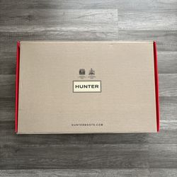Dark green hunter boots