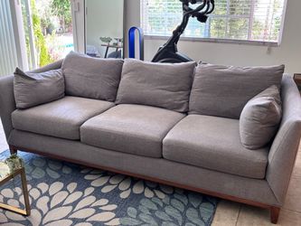 Large plush gray sofa