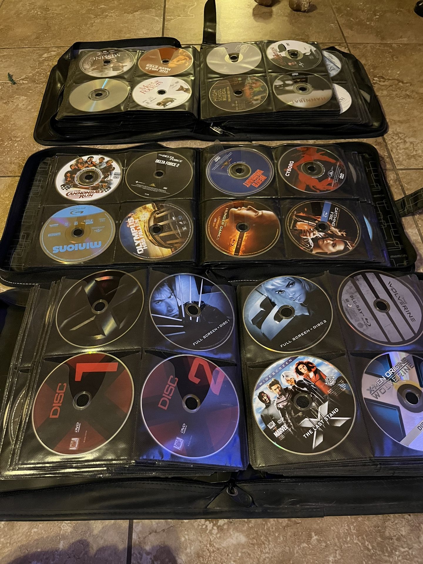 Over 600 Blu-ray Disks And DVD’s In 3 Sleeves