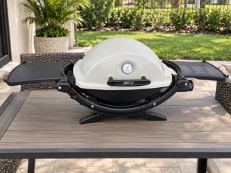 Weber Q 120 Portable Liquid Propane Gas Grill Table Top BBQ! Works great, has to be lit using a lighter. Great for tailgates! Retails $279