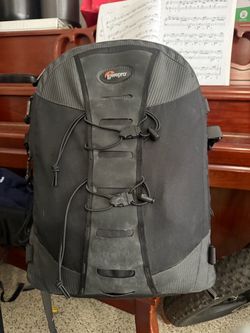 ---  **Lowepro Photo Trekker AW II Camera Backpack — $60**