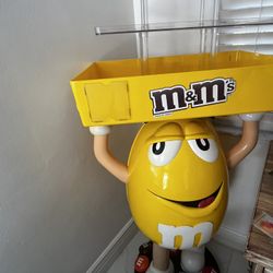 Yellow M&M Statue On Wheels With Tray & Plastic