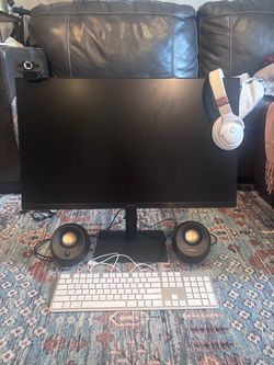 Samsung computer monitor 24 inches, headphones, camera, speakers, and keyboard