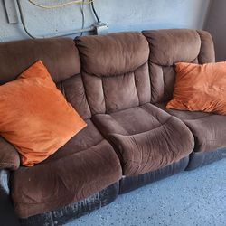 Brown cloth and leather couch