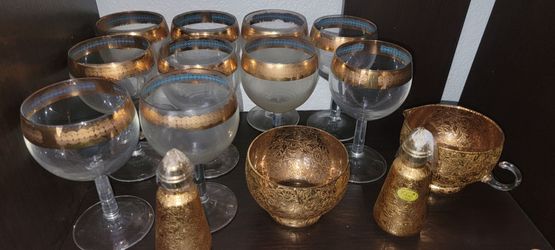 Goblet, salt-and-pepper shakers, sugar and cream bowls