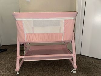 Baby pink bassinet