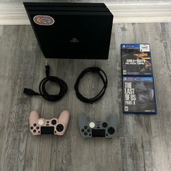 PS4 With Controllers And 2 Games