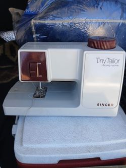 Tiny Tailor mending machine
