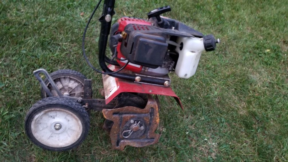 Earthquake mc43 mini cultivator tiller rototiller 43cc in working