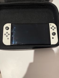 Nintendo Switch OLED Bundle + Extra Joy-Cons & Case — $190