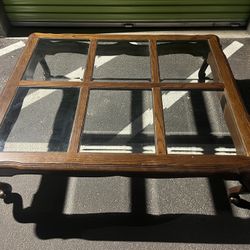 Wooden 6 glass panel coffee table.