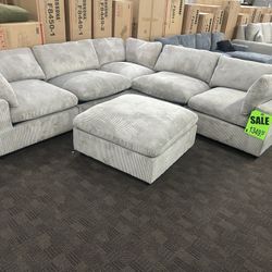 Light Gray Cloud Sectional And Ottoman 