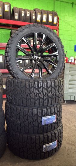 Gloss Black Wheels 22x9 6x139.7 with MT Tires Set of 4