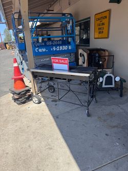 Propane/charcoal grill (portable)