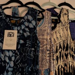 Four Ladies Dresses. $50  Beautiful Presents. All New 