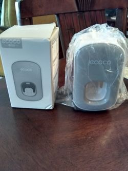 Tooth Paste Dispenser, Color Gray And White 