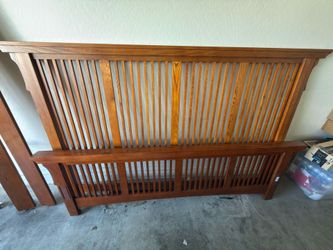 Amish Mission-style oak spindle bed frame