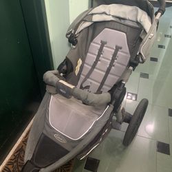 Jogger Stroller And Extra Wheel  Graco 