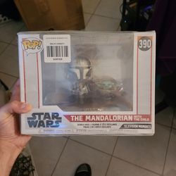 Funko Pop The Mandalorian with the child figure
